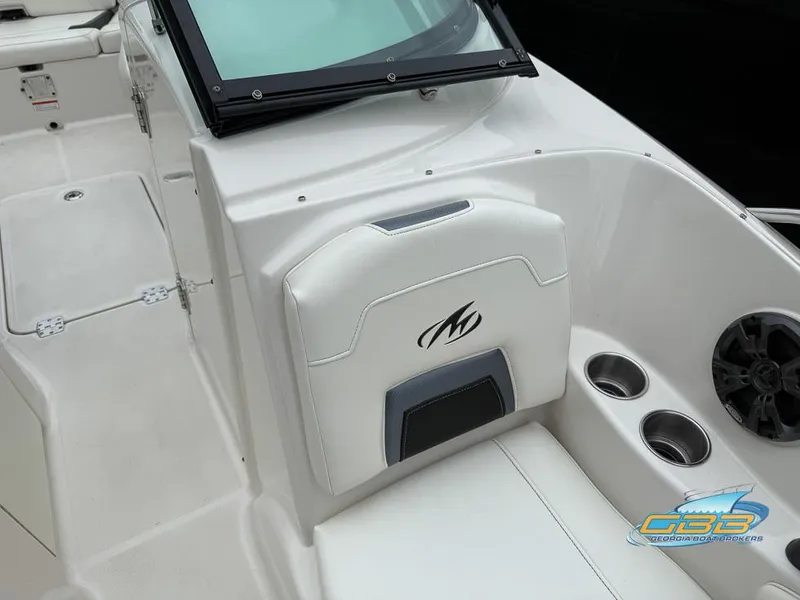 Slide: The Image of 2014 Monterey 244FS boat interior with seating and cup holders. - 15