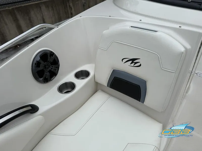 Slide: The Image of 2014 Monterey 244FS boat interior with speaker and cup holders. - 16