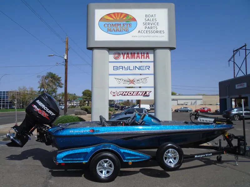 Slide: The Image of 2018 Ranger Z518 Comanche boat on trailer at Complete Marine dealership. - 19