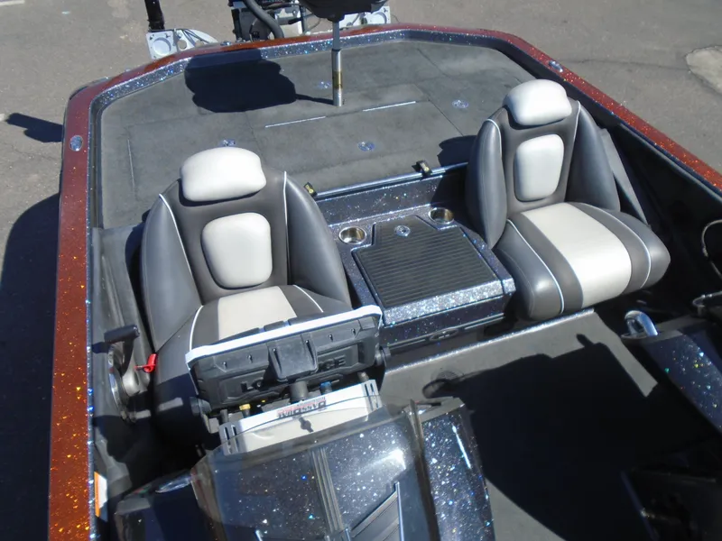 Slide: The Image of 2015 Ranger Z521 Comanche boat interior with dual seats and control panel. - 13