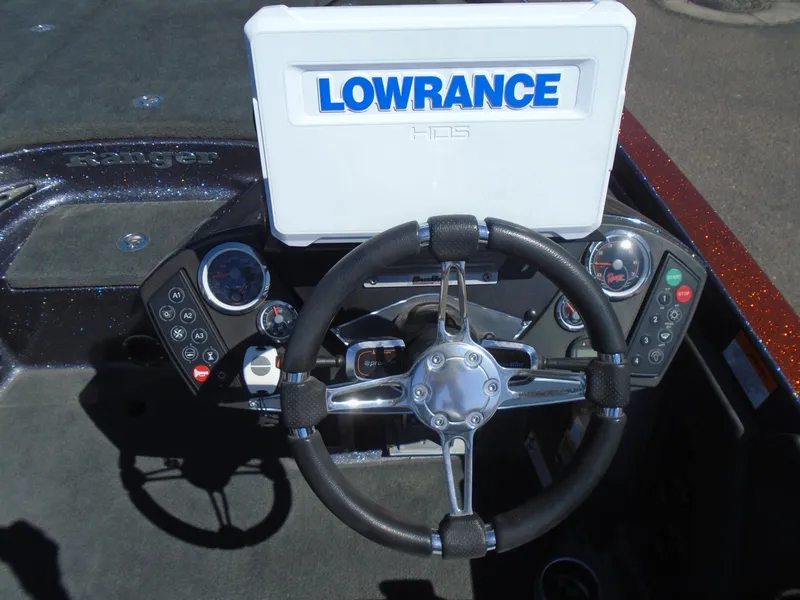 Slide: The Image of Steering console of 2015 Ranger Z521 Comanche boat with Lowrance HDS display. - 16