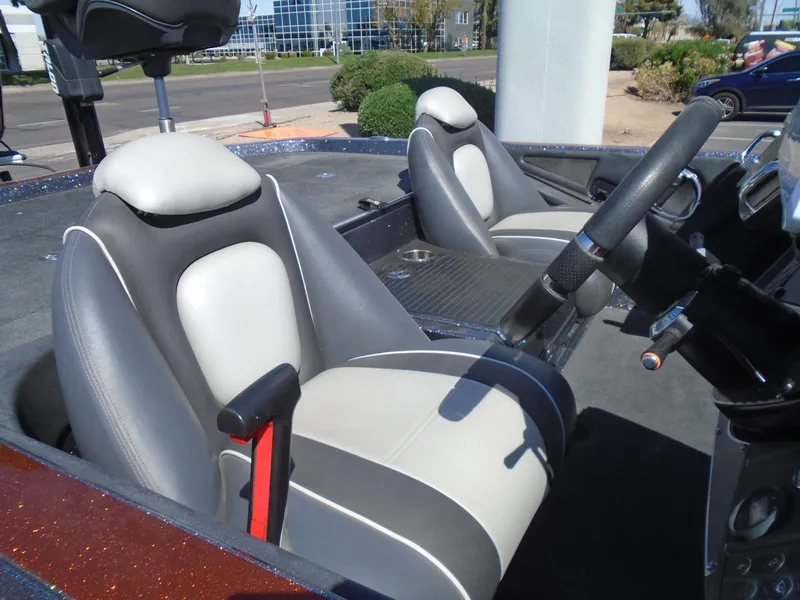 Slide: The Image of 2015 Ranger Z521 Comanche boat interior with dual seats and steering wheel. - 18