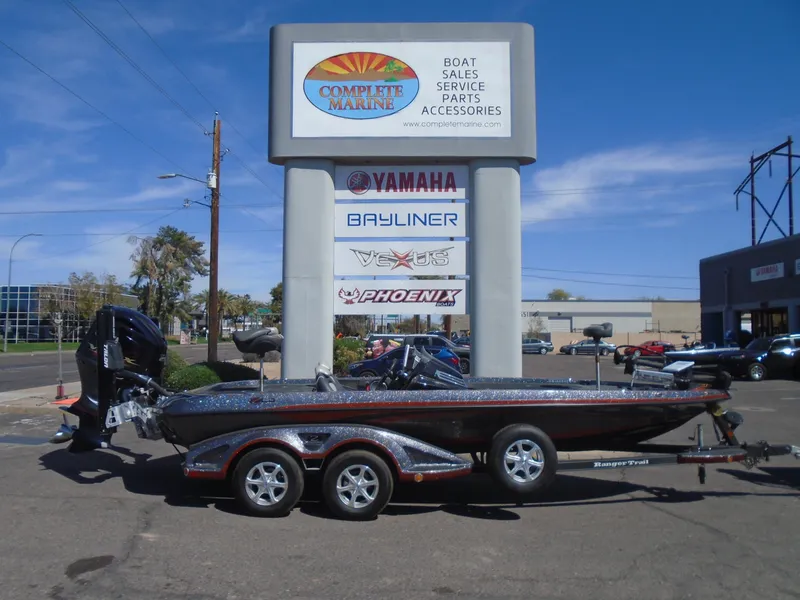 Slide: The Image of 2015 Ranger Z521 Comanche boat on trailer at Complete Marine dealership. - 21