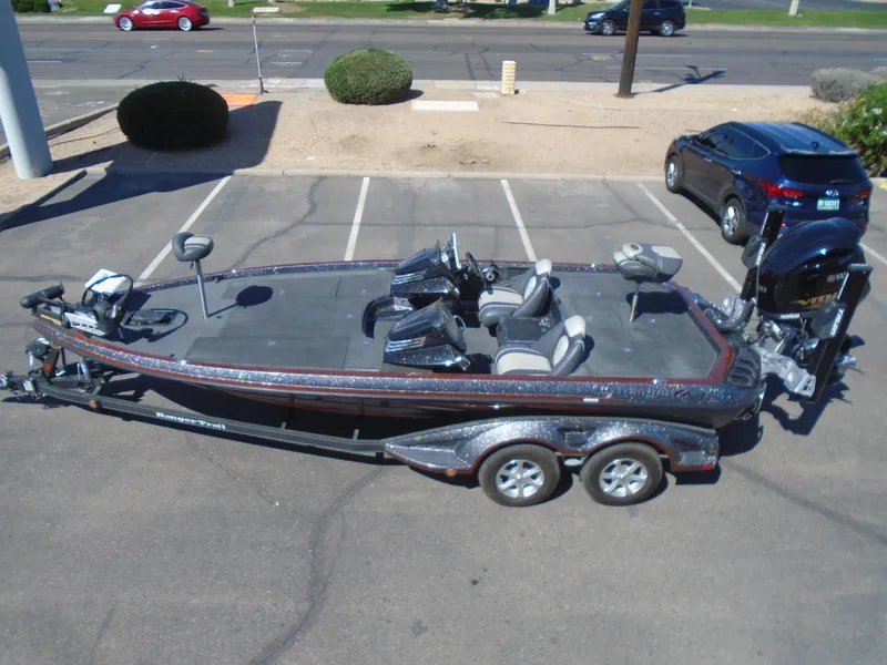 Slide: The Image of 2015 Ranger Z521 Comanche bass boat in parking lot, side view. - 3