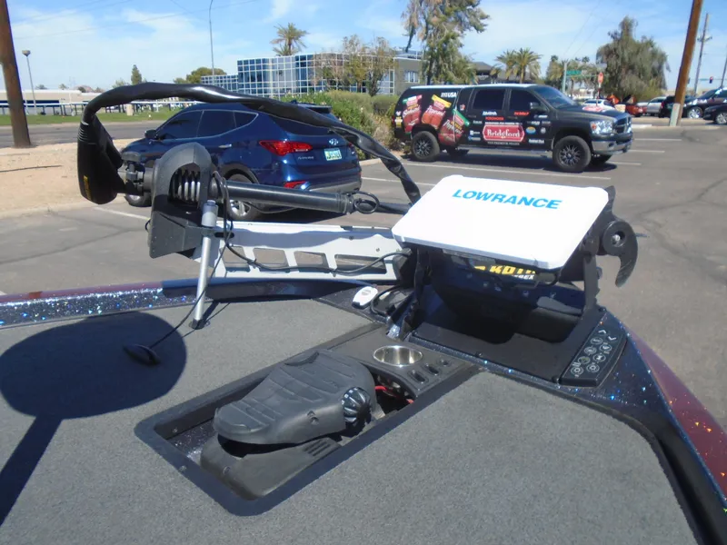 Slide: The Image of 2015 Ranger Z521 Comanche boat with Lowrance electronics in a parking lot. - 9