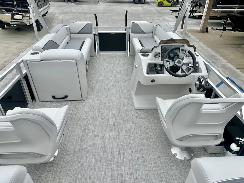 Slide: The Image of 2025 Avalon 23' Venture Quad Lounger with 150HP Mercury, featuring spacious seating and modern helm. - 13