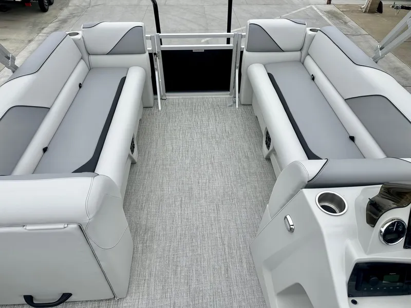 Slide: The Image of 2025 Avalon 23' Venture Quad Lounger interior with sleek seating and modern design. - 7