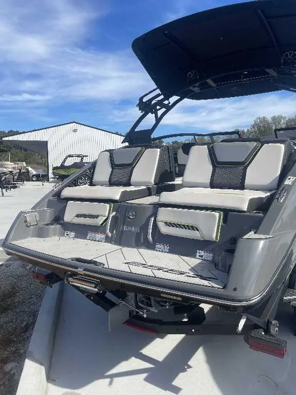 Slide: The Image of 2021 Yamaha Boats 255X with sleek seating and modern design. - 13