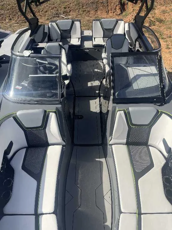 Slide: The Image of 2021 Yamaha Boats 255X interior with sleek seating and modern design. - 4