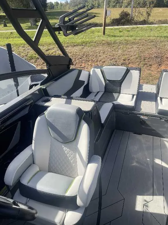 Slide: The Image of Interior of 2021 Yamaha Boats 255X, featuring sleek seating and modern design elements. - 7