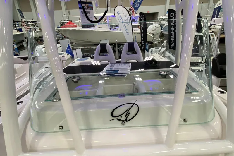 Slide: The Image of 2024 Sailfish 242 CC boat interior with modern seating and sleek design. - 10