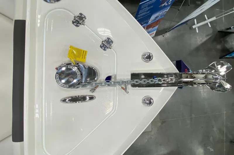 Slide: The Image of 2024 Sailfish 242 CC boat anchor system with chain and cleats. - 4