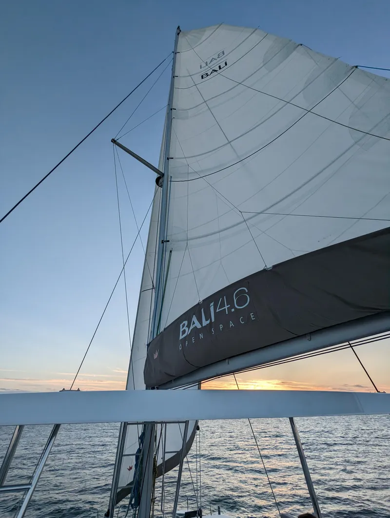 Slide: The Image of Sailing yacht Bali 4.6 at sunset, 2022 model, on open sea. - 24