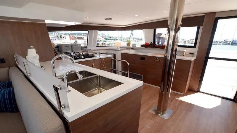 Slide: The Image of Modern kitchen interior on 2022 Bali 4.6 yacht with sleek design and ample natural light. - 3