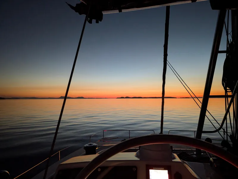 Slide: The Image of Sunset view from a 2022 Bali 4.6 yacht, calm sea and vibrant horizon. - 36