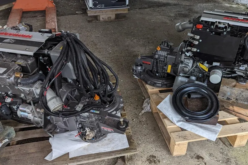 Slide: The Image of Two Bali 4.6 engines from 2022 on wooden pallets in a workshop. - 65