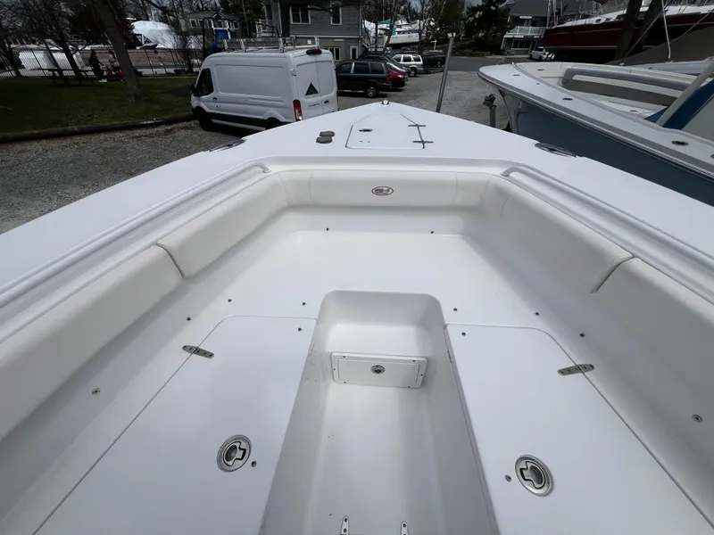 Slide: The Image of 2020 Sea Hunt Gamefish 27 Forward Seating boat interior, showcasing spacious seating and storage. - 24