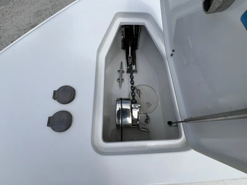 Slide: The Image of Anchor compartment of 2020 Sea Hunt Gamefish 27 Forward Seating boat. - 25