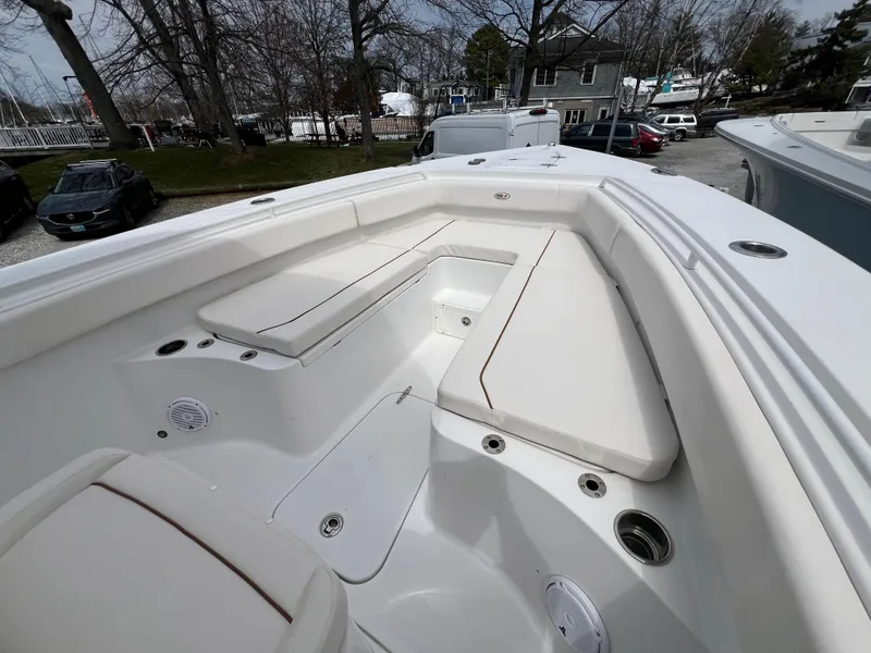 Slide: The Image of 2020 Sea Hunt Gamefish 27 Forward Seating boat with spacious white seating area. - 32
