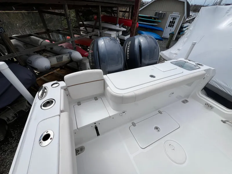 Slide: The Image of 2020 Sea Hunt Gamefish 27 boat with forward seating and dual Yamaha engines. - 8