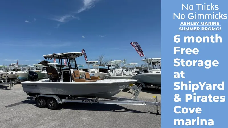 Slide: The Image of 2025 Sea Pro 230 Bay boat on trailer, Ashley Marine summer promo offering six months free storage. - 1