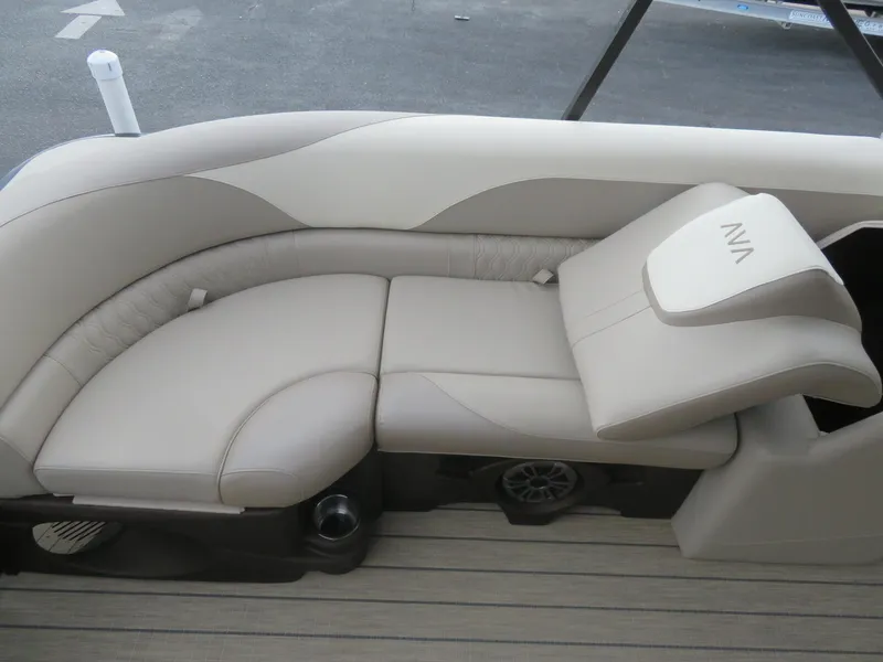 Slide: The Image of Luxurious seating on 2025 Avalon LSZ Quad Lounger boat, featuring elegant beige upholstery. - 27