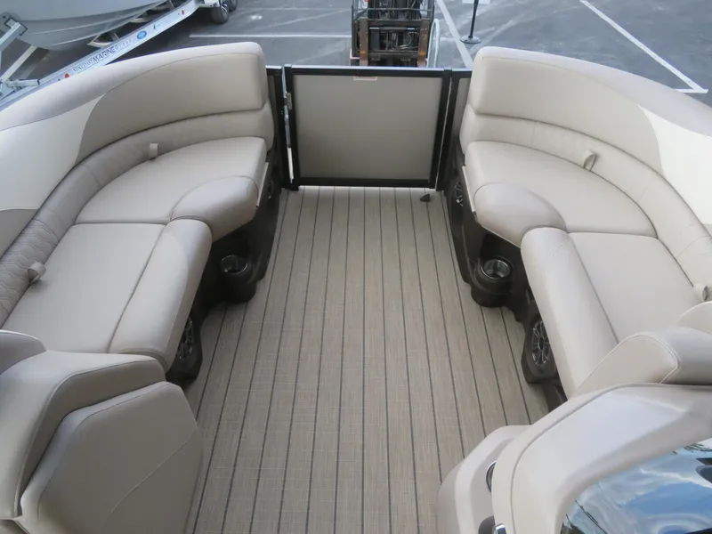 Slide: The Image of 2025 Avalon LSZ Quad Lounger interior with beige seating and spacious layout. - 30