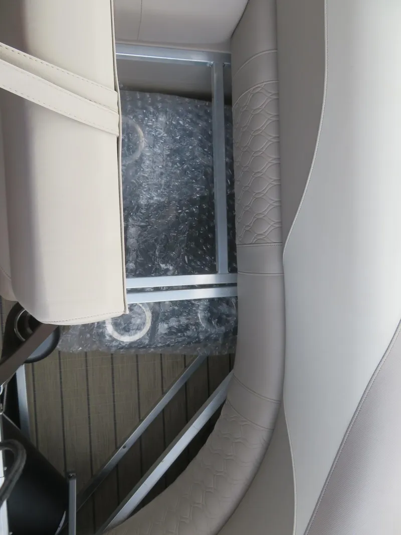 Slide: The Image of 2025 Avalon LSZ Quad Lounger interior with beige seating and metal framework. - 33