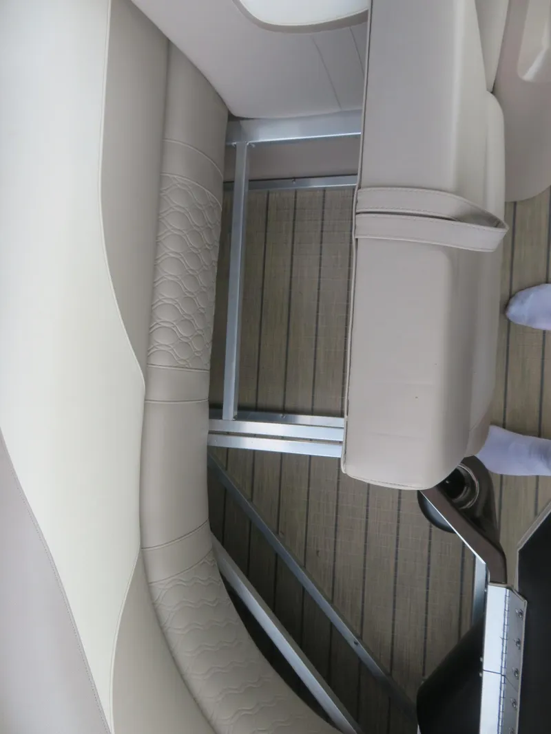 Slide: The Image of 2025 Avalon LSZ Quad Lounger interior with beige seating and metal frame. - 34