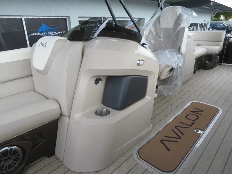 Slide: The Image of 2025 Avalon LSZ Quad Lounger interior with beige seating and branded flooring. - 36