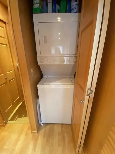 Slide: The Image of Stacked washer and dryer in 2007 Sharpe 18 x 84 houseboat laundry area. - 17