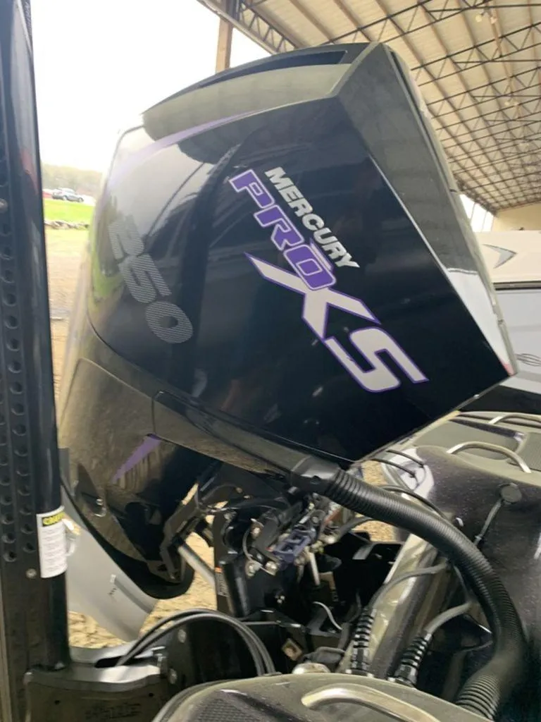 Slide: The Image of 2021 Phoenix Bass Boats 20 PHX with Mercury Pro XS engine. - 2