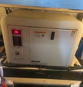 Slide: The Image of Kohler Power Systems generator in a 1989 Viking 41 Convertible boat. - 14
