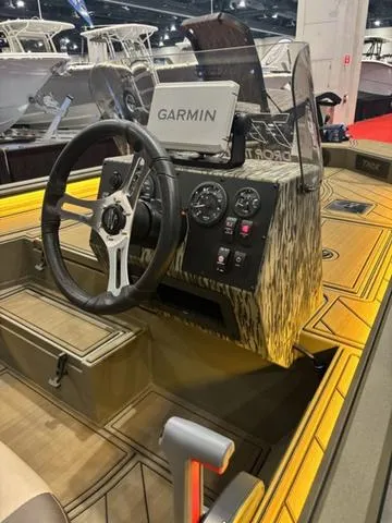 Slide: The Image of 2025 Thor LH1900 DLX Side Console boat with Baystar steering and Garmin navigation system. - 18