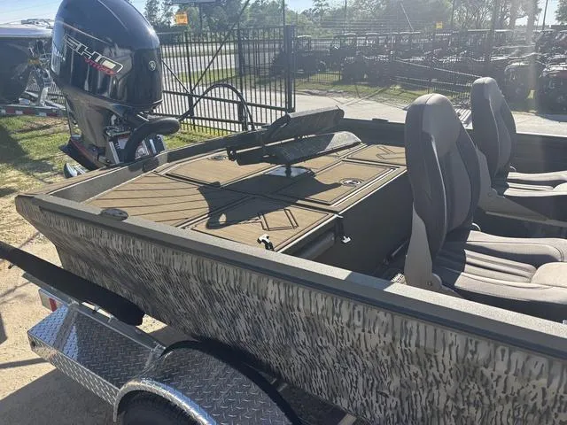 Slide: The Image of 2025 Thor LH1900 DLX boat with Baystar steering, featuring illuminated deck and side console. - 4