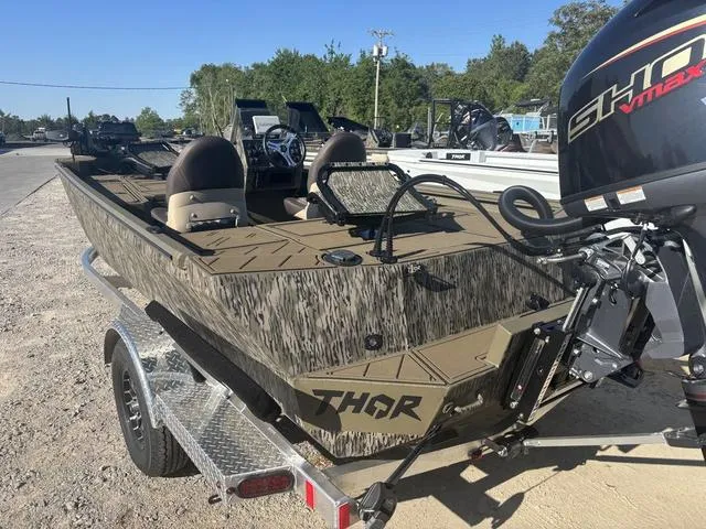 Slide: The Image of 2025 Thor LH1900 DLX boat with Baystar steering and Garmin navigation system. - 7