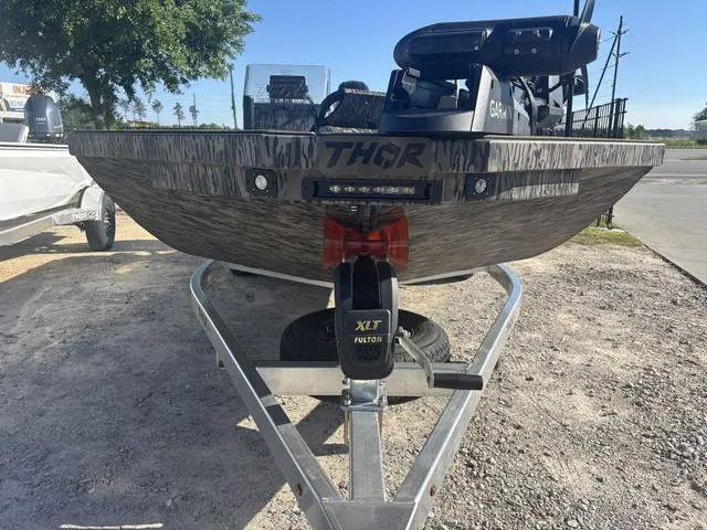 Slide: The Image of 2025 Thor LH1900 DLX boat with Baystar steering, featuring illuminated deck and side console. - 8