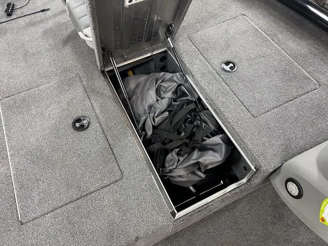 Slide: The Image of 2017 Tracker Pro Team™ 175 TXW boat storage compartment with gear inside. - 19