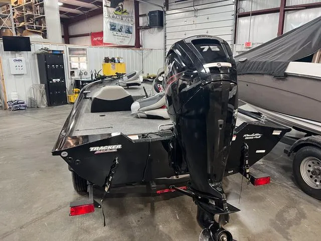 Slide: The Image of 2017 Tracker Pro Team™ 175 TXW boat with trailer in a garage setting. - 4