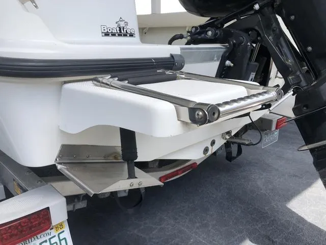 Slide: The Image of Propeller of a 2009 Mako 204 Center Console boat on a textured surface. - 10