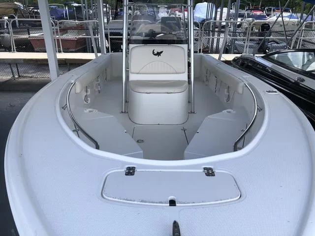 Slide: The Image of 2009 Mako 204 Center Console boat on trailer, side view. - 7
