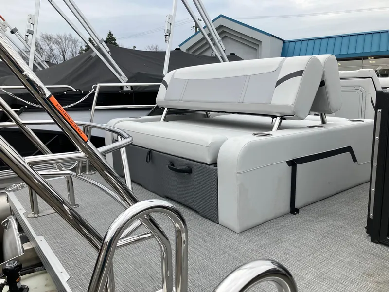 Slide: The Image of 2024 Crest 240 SLSC Classic LX boat interior with sleek seating and modern design. - 3