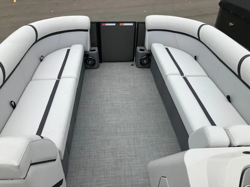 Slide: The Image of 2024 Crest 240 SLSC Classic LX boat interior with sleek seating and modern design. - 8