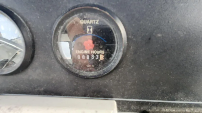 Slide: The Image of Engine hour meter showing 833 hours on 1995 Carver 440 Aft Cabin Motor Yacht. - 19