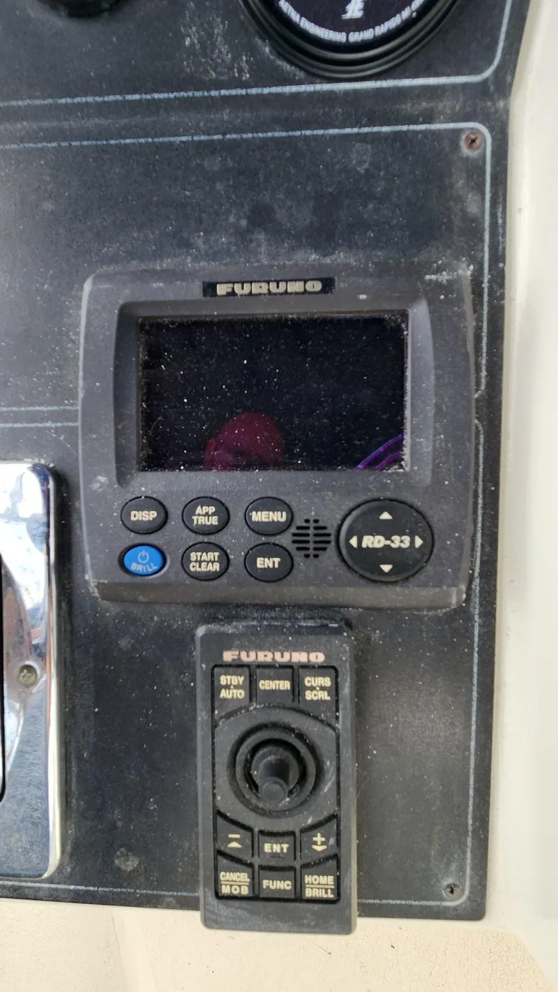 Slide: The Image of Furuno navigation system on 1995 Carver 440 Aft Cabin Motor Yacht dashboard. - 22