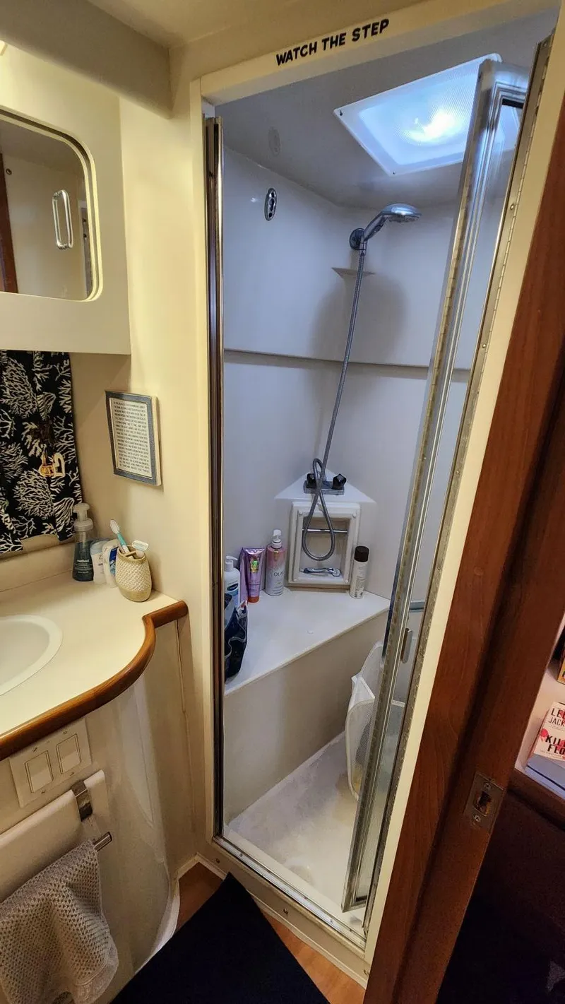 Slide: The Image of Bathroom in 1995 Carver 440 Aft Cabin Motor Yacht with shower and sink. - 40