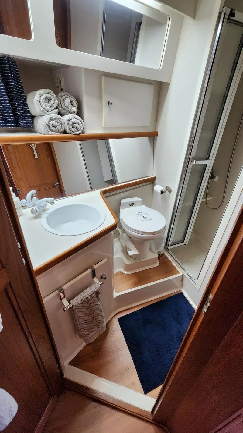 Slide: The Image of Bathroom interior of 1995 Carver 440 Aft Cabin Motor Yacht with shower and sink. - 45