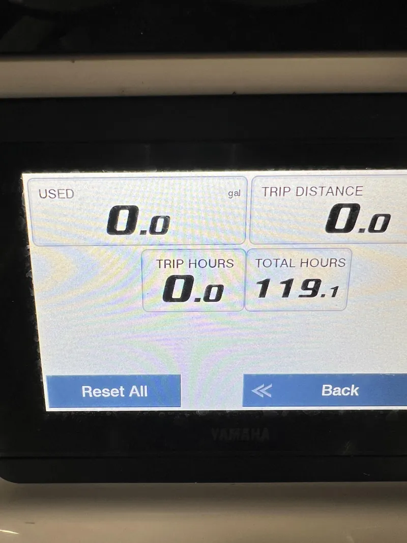 Slide: The Image of Display screen of 2022 Sea Hunt BX25FS showing trip and total hours. - 16