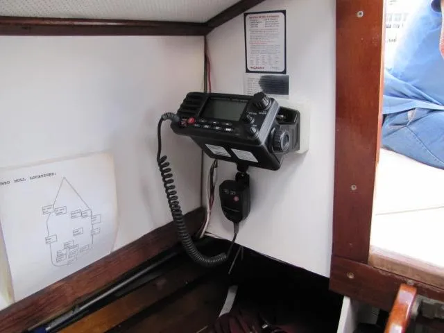 Slide: The Image of Radio equipment inside a 1974 Custom Lazy Jack 32 boat cabin. - 23