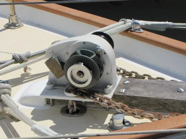 Slide: The Image of Anchor windlass on 1974 Custom Lazy Jack 32 sailboat deck. - 7